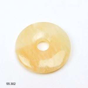 Calcite jaune clair donut 3 cm. OFFRE SPECIALE